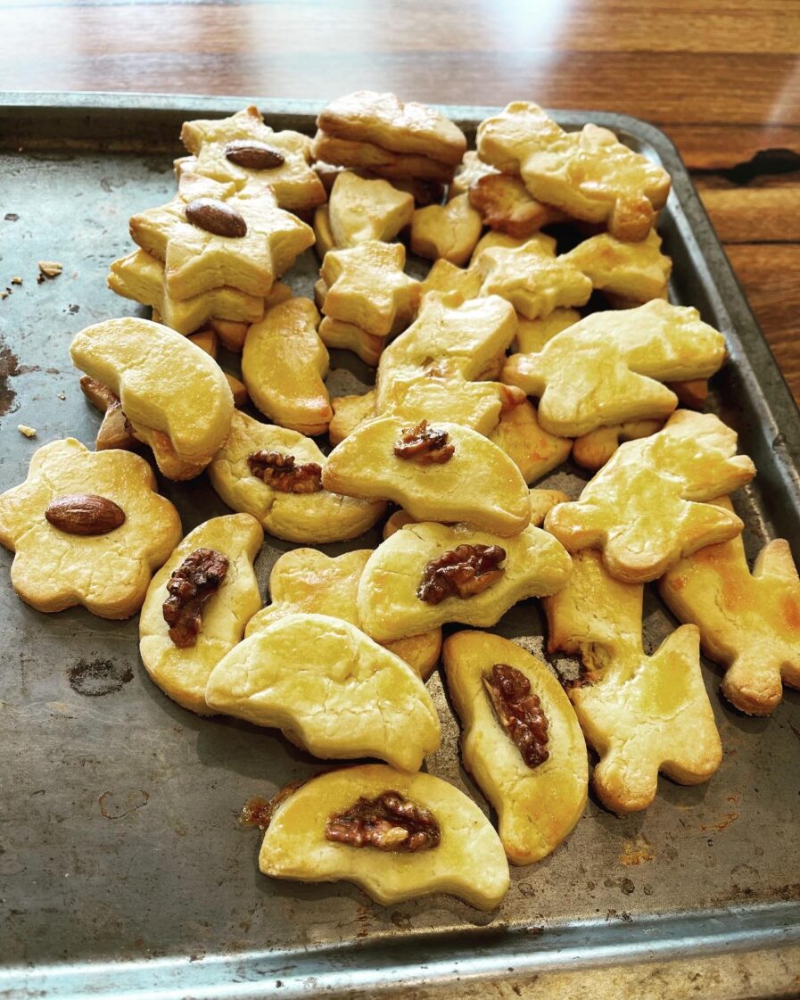 Showing freshly baked Swiss Style Christmas Cookies called Mailaenderli)